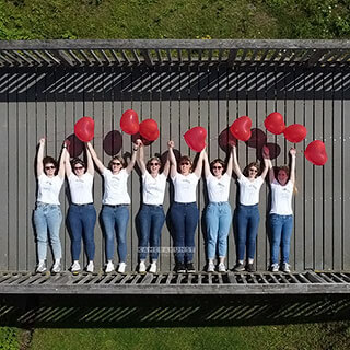 From an unusual perspective, the photographer takes fun bachelorette party pictures with the drone.