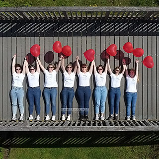 The photographer creates fun bachelorette party pictures from unusual perspective with the drone.